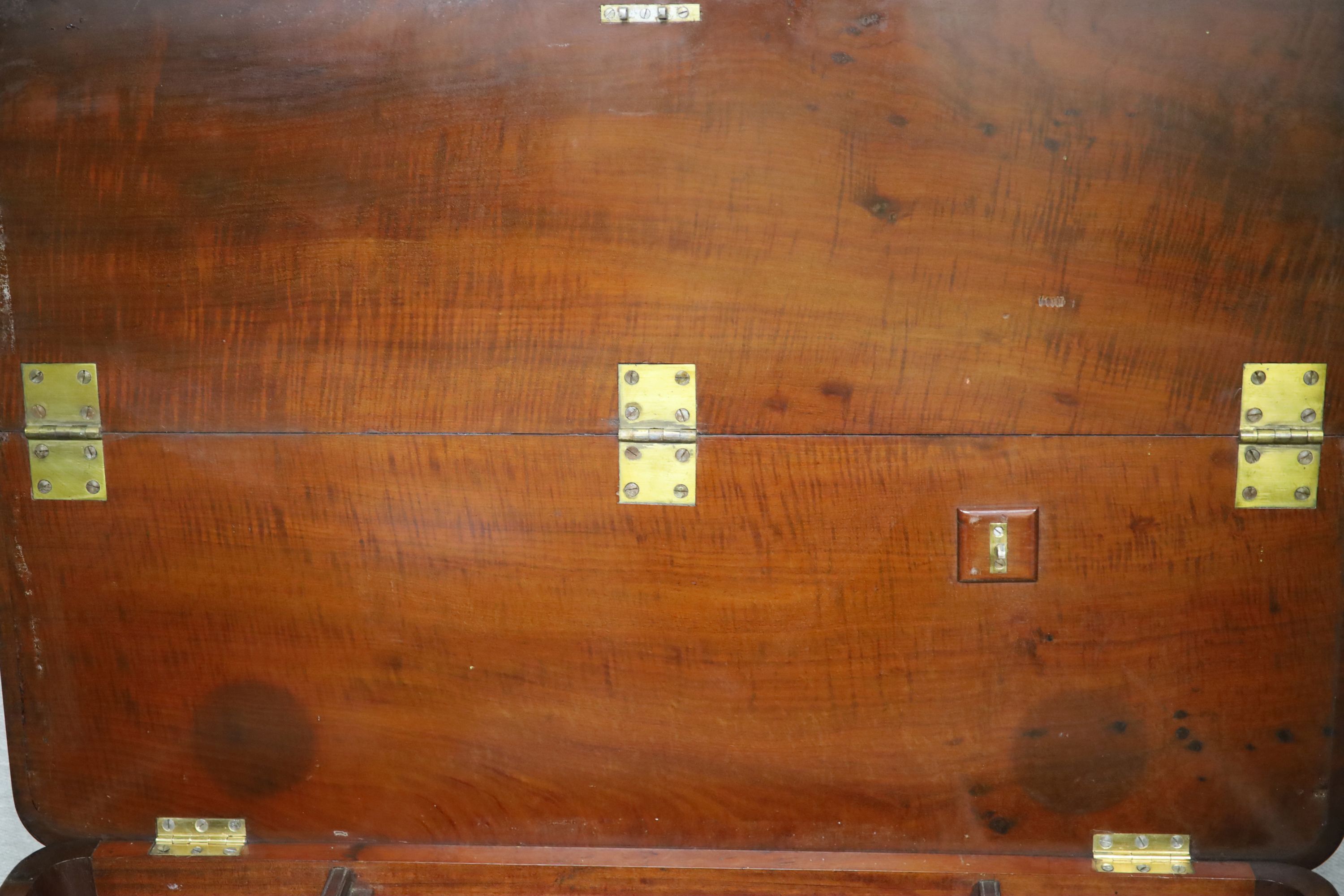 A Regency satin banded inlaid mahogany hinged top writing table, width 93cm depth 61cm height 75cm